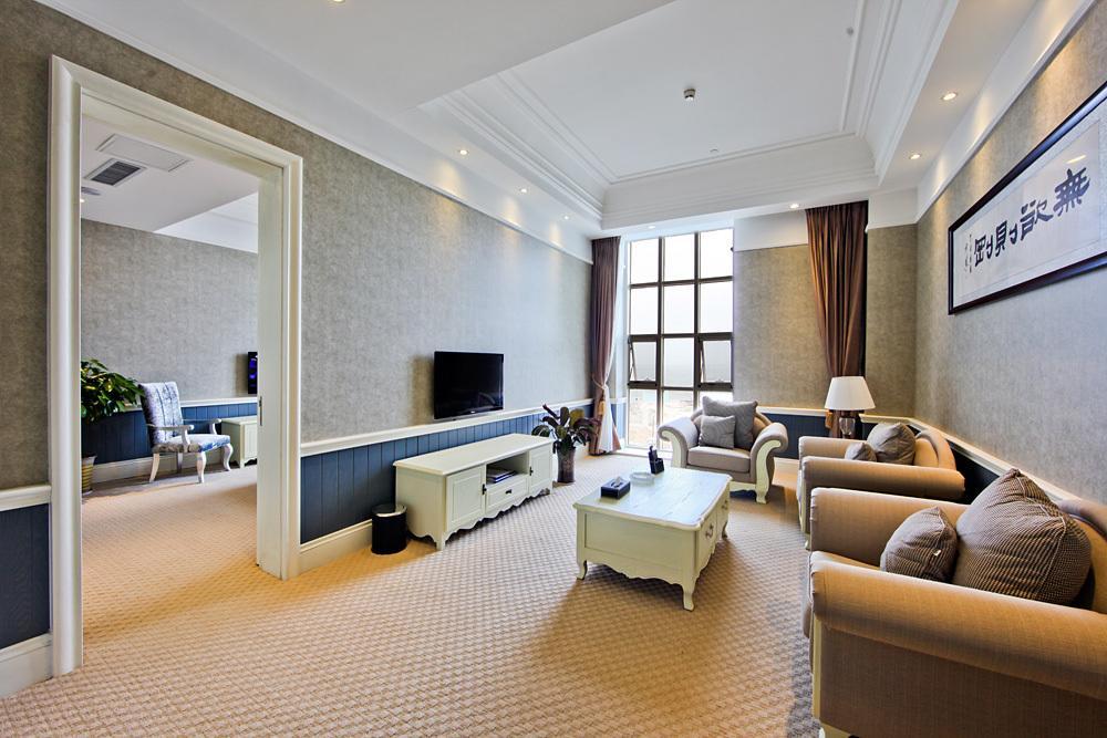 Blue Sky Hotel Yantai Habitación foto